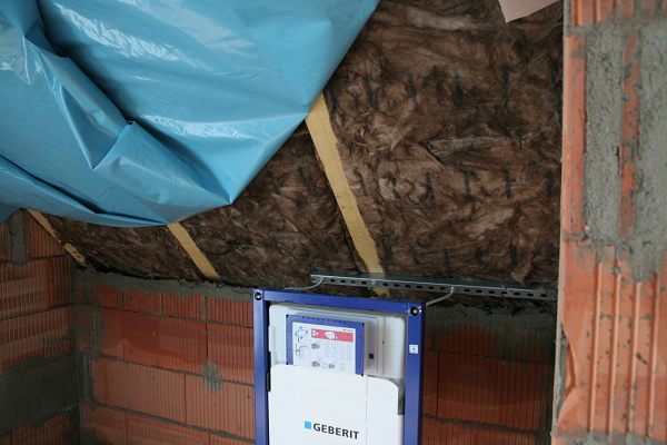 Insulation and moisture barrier under the roof.